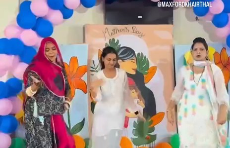 Primary students performing on stage